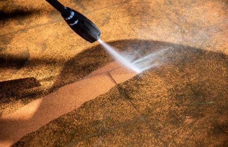 washing-the-backyard-tiles-with-high-pressure-clea-2023-11-27-05-03-58-utc-min